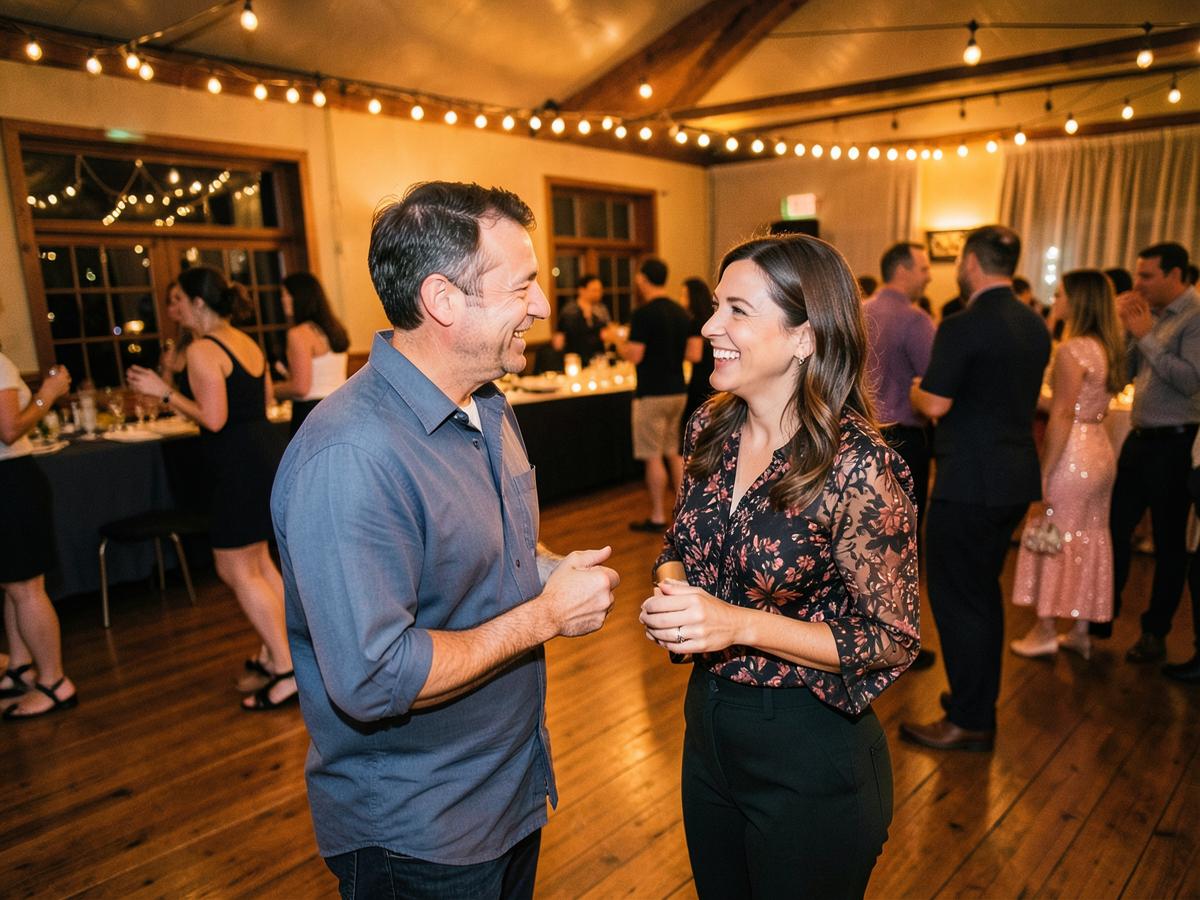 Two people chatting at a country line dancing night